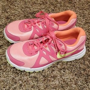 Girls pink Nike tennis shoes size 4